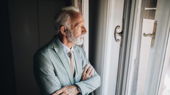 Senior man looking out the window - senior man stock pictures and royalty-free images.
