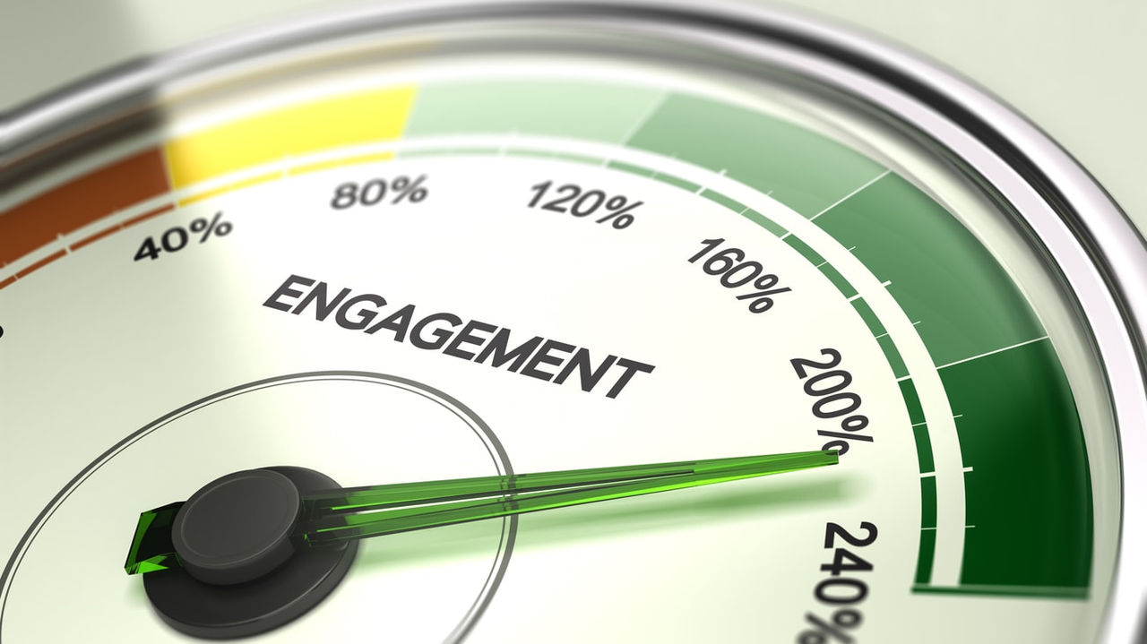 A close up of a gauge with the word engagement.