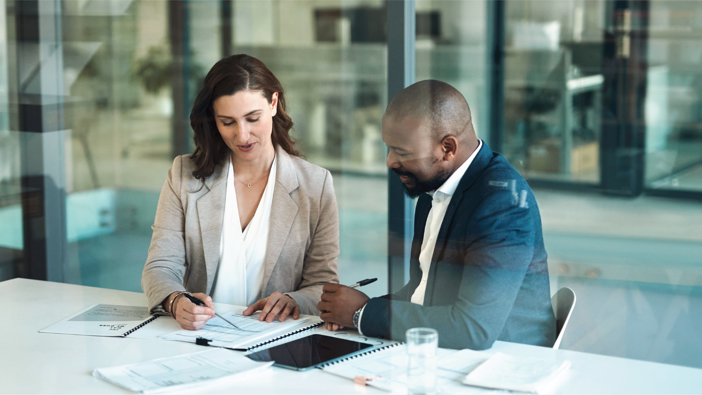 Two people talking to showcase mentorship. 