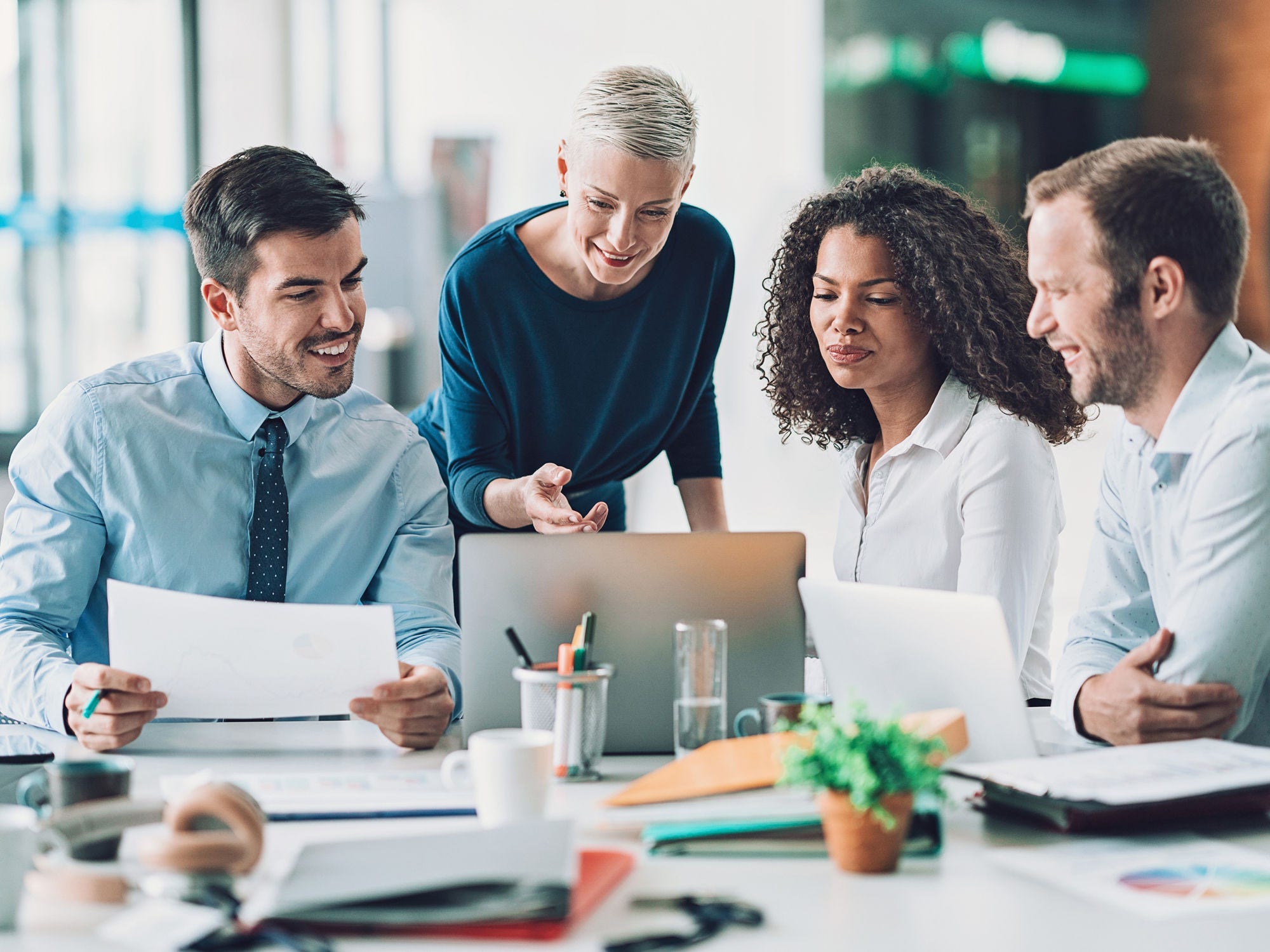 Team of research executives collaborate on a project.