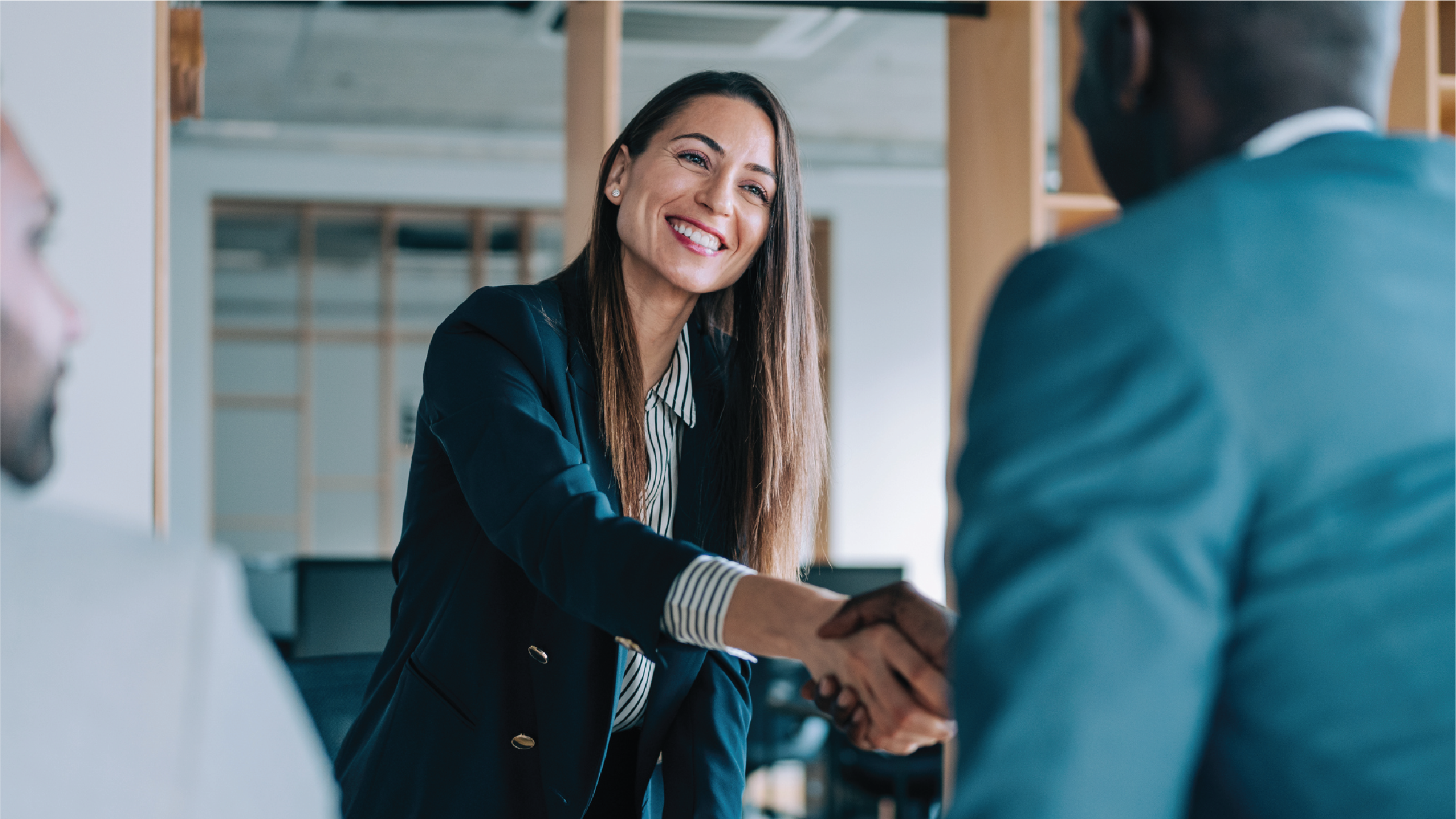 Two professionals shaking hands