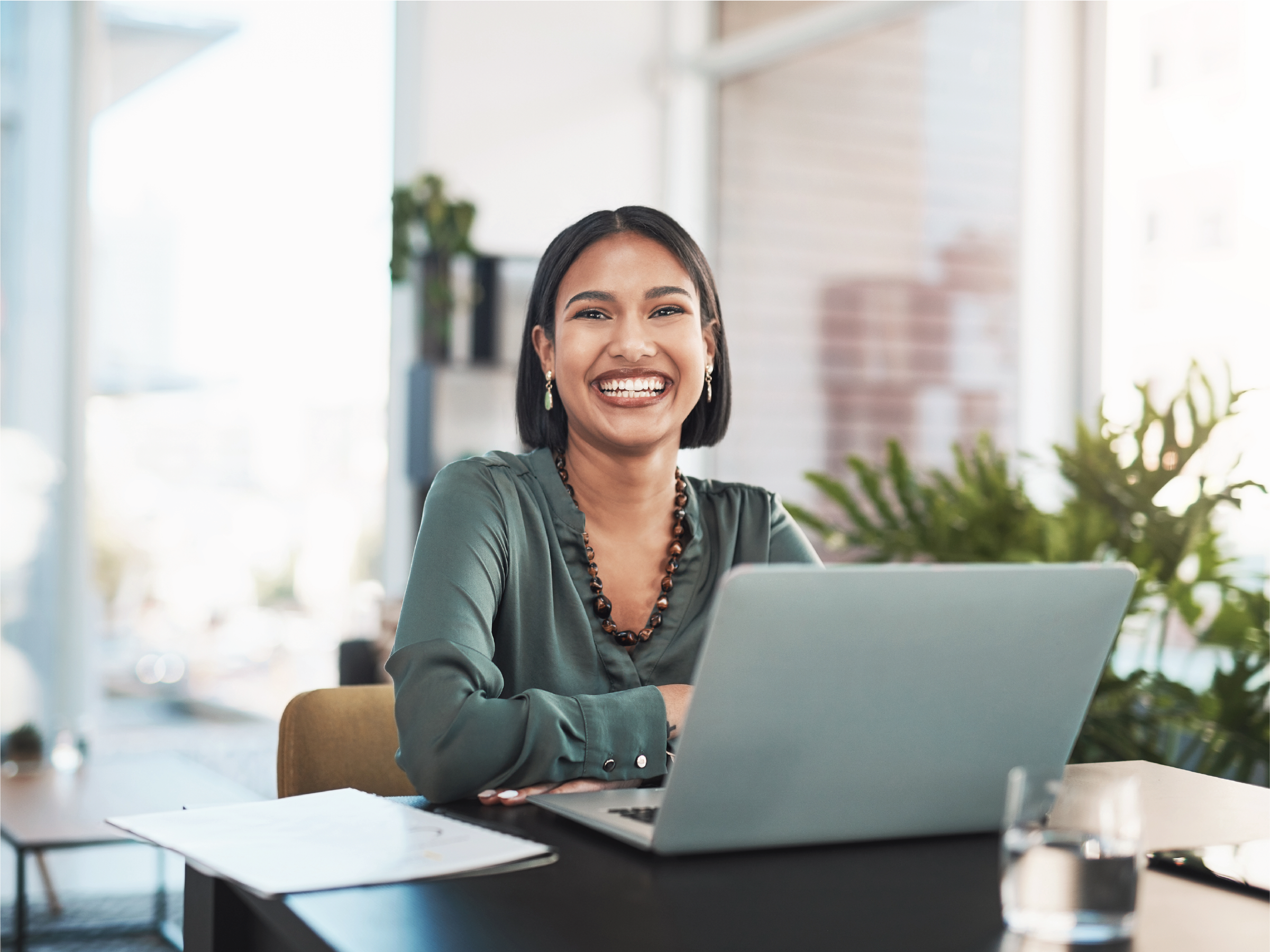 smiling woman on laptop smiling woman on laptop