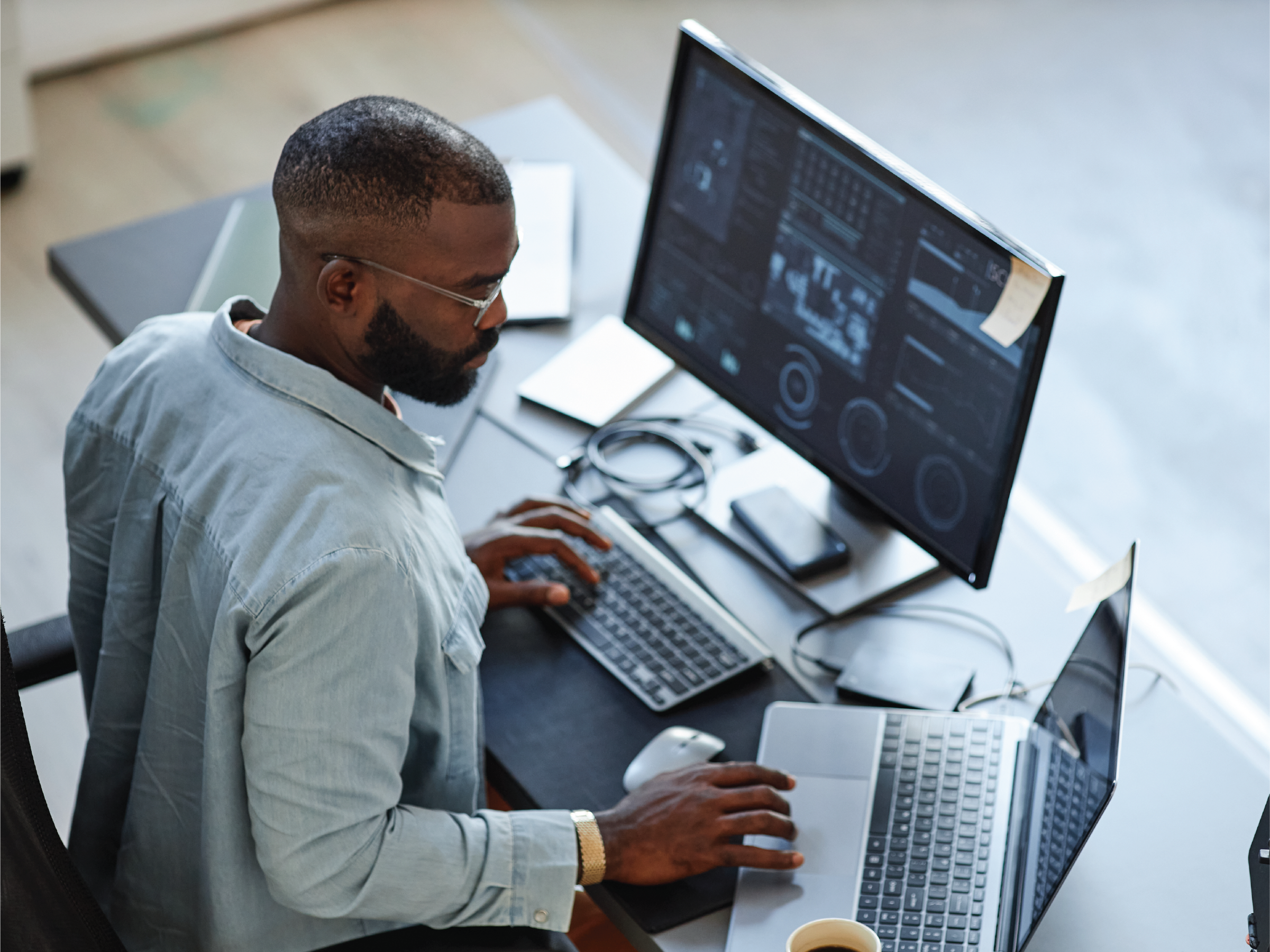 man seated using computer