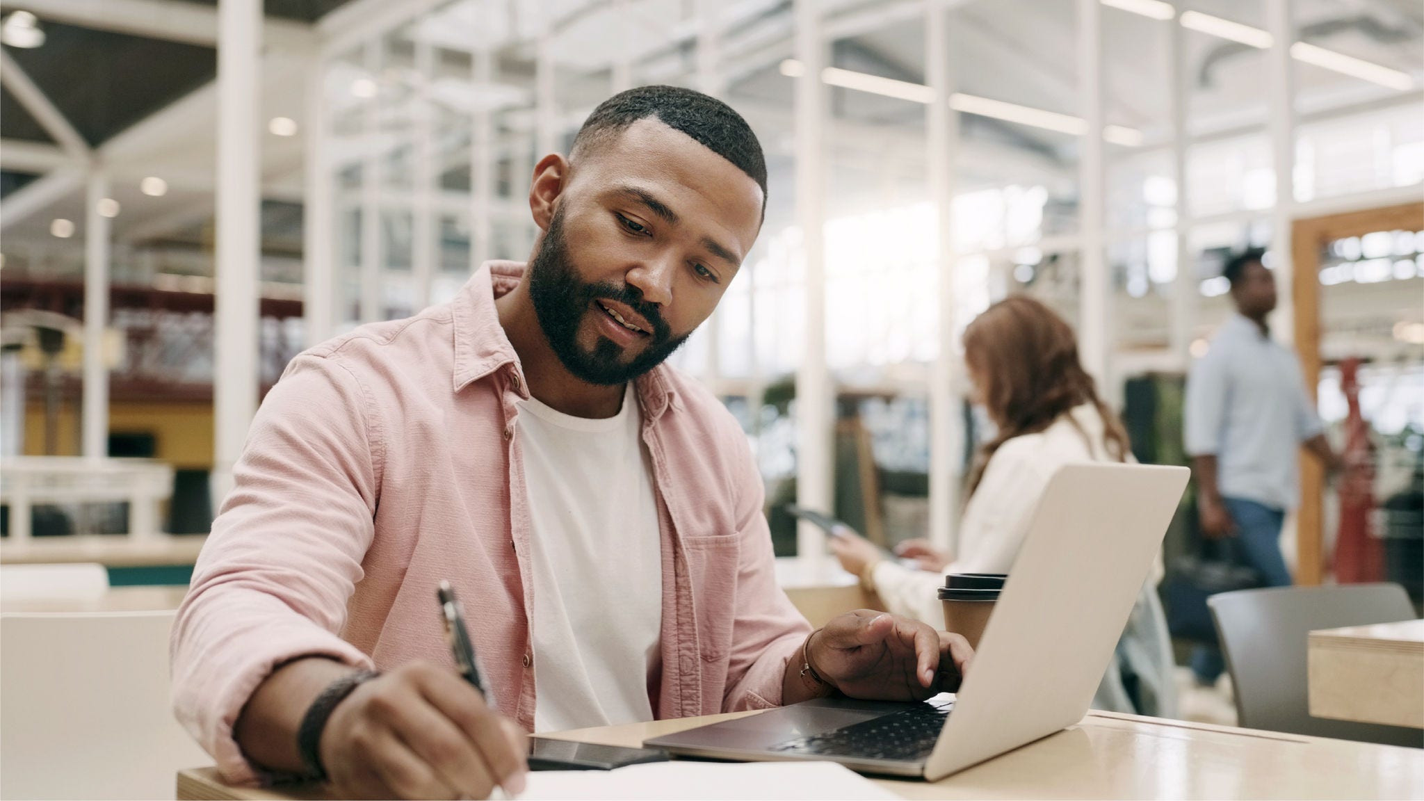 Man prepares for his exam on his laptop