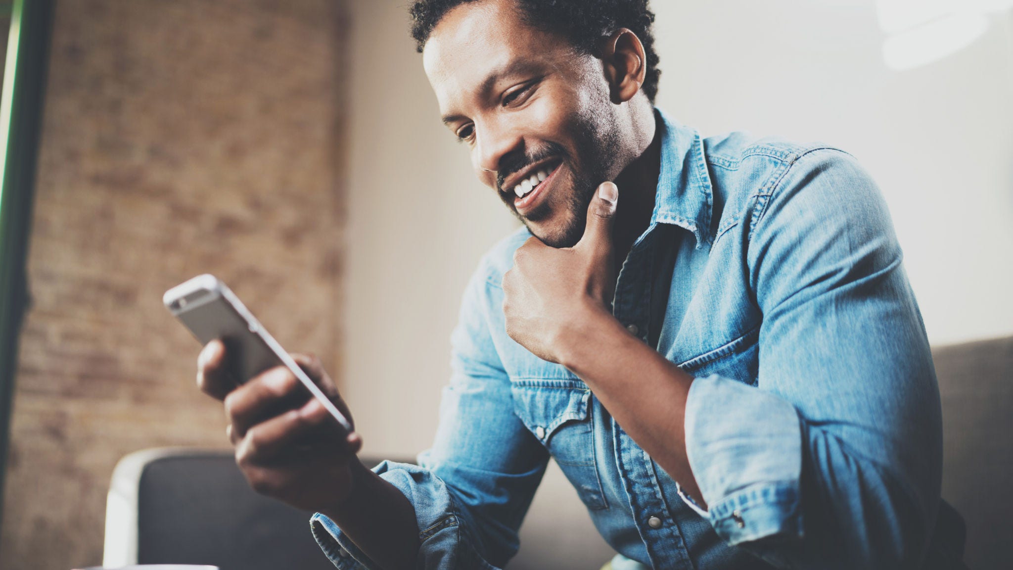 Man looking at a mobile phone