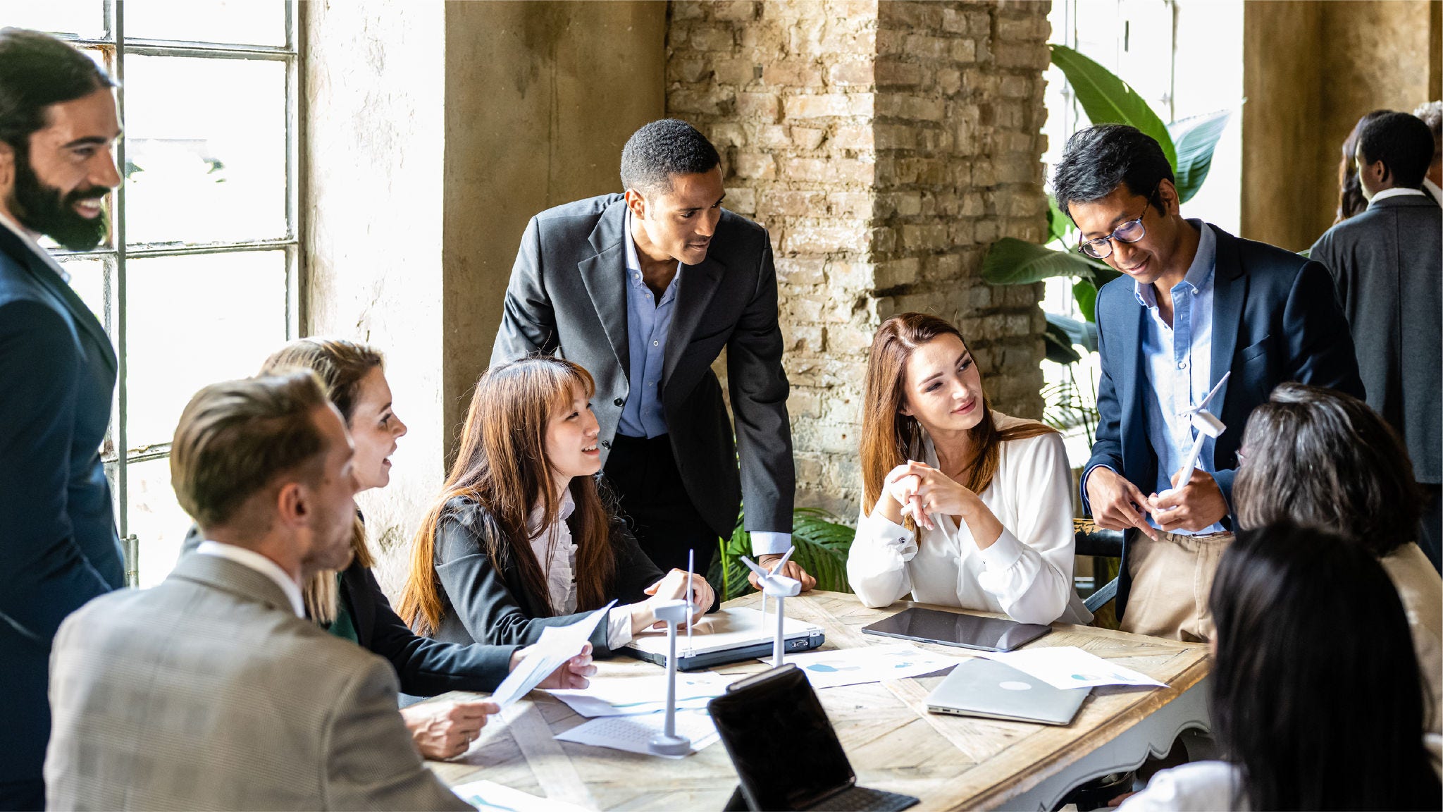 Coworkers collaborate in a shared office space. 