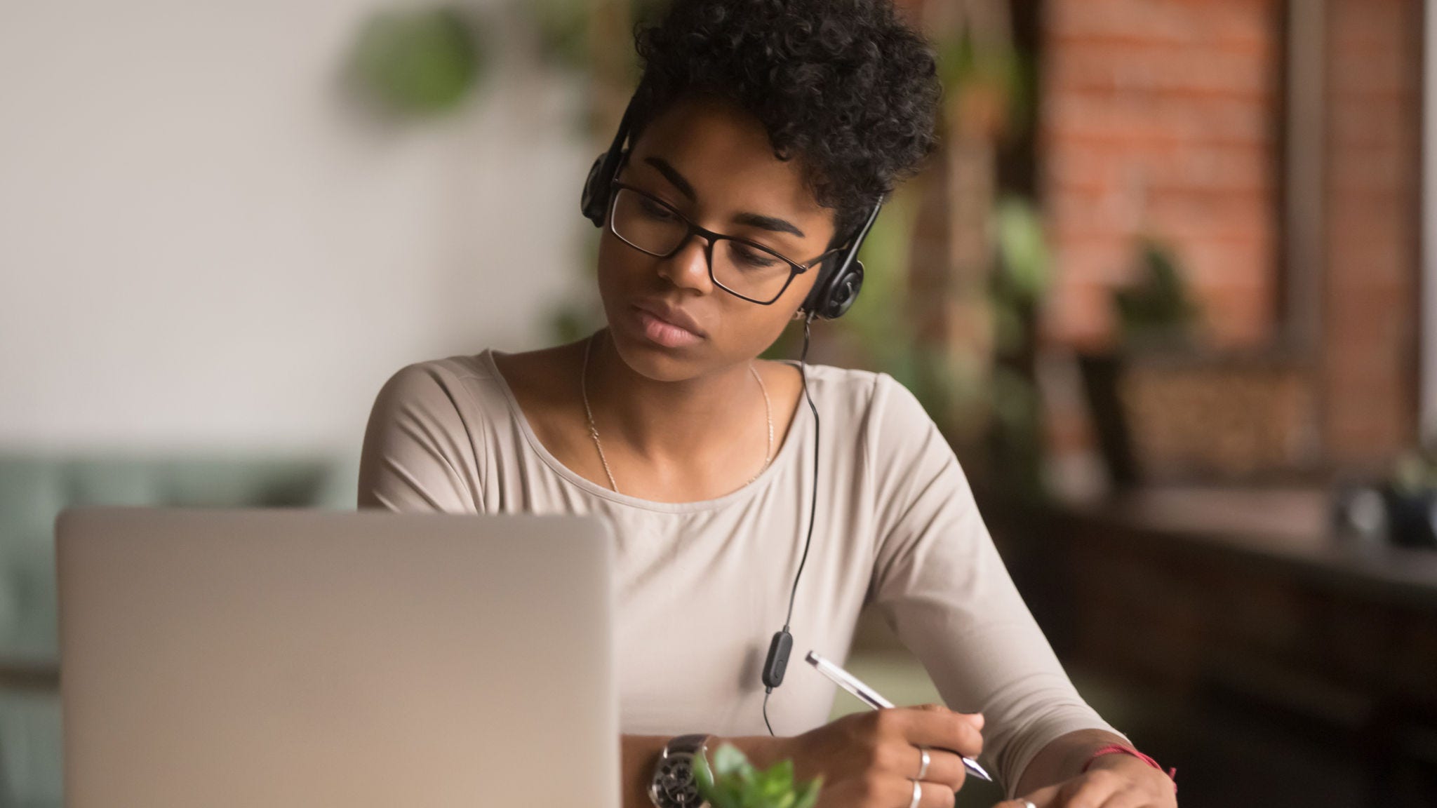 Woman looking at a computer