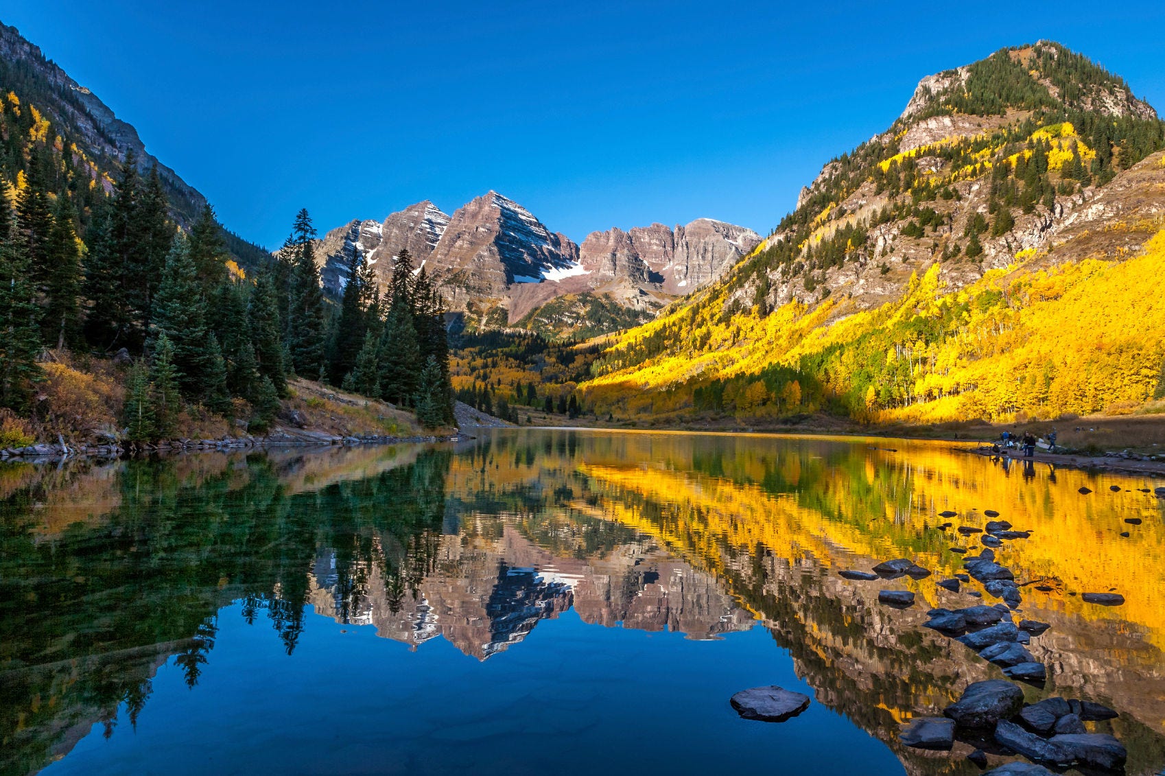 Mountains reflecting in water