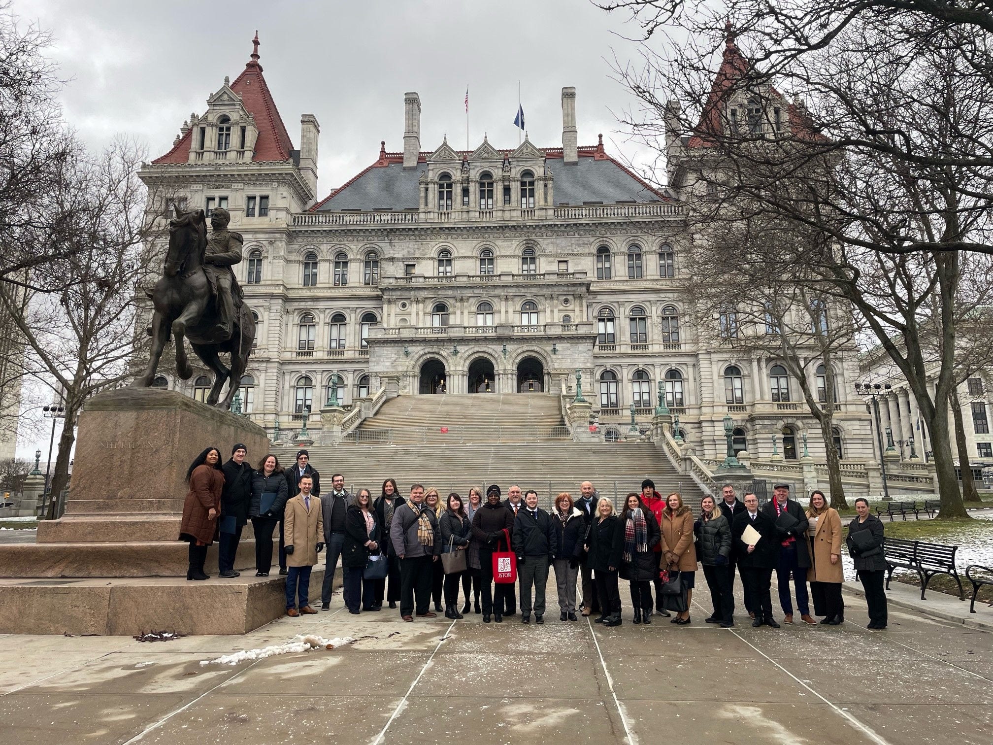 shrm members in front of NY state capitol building