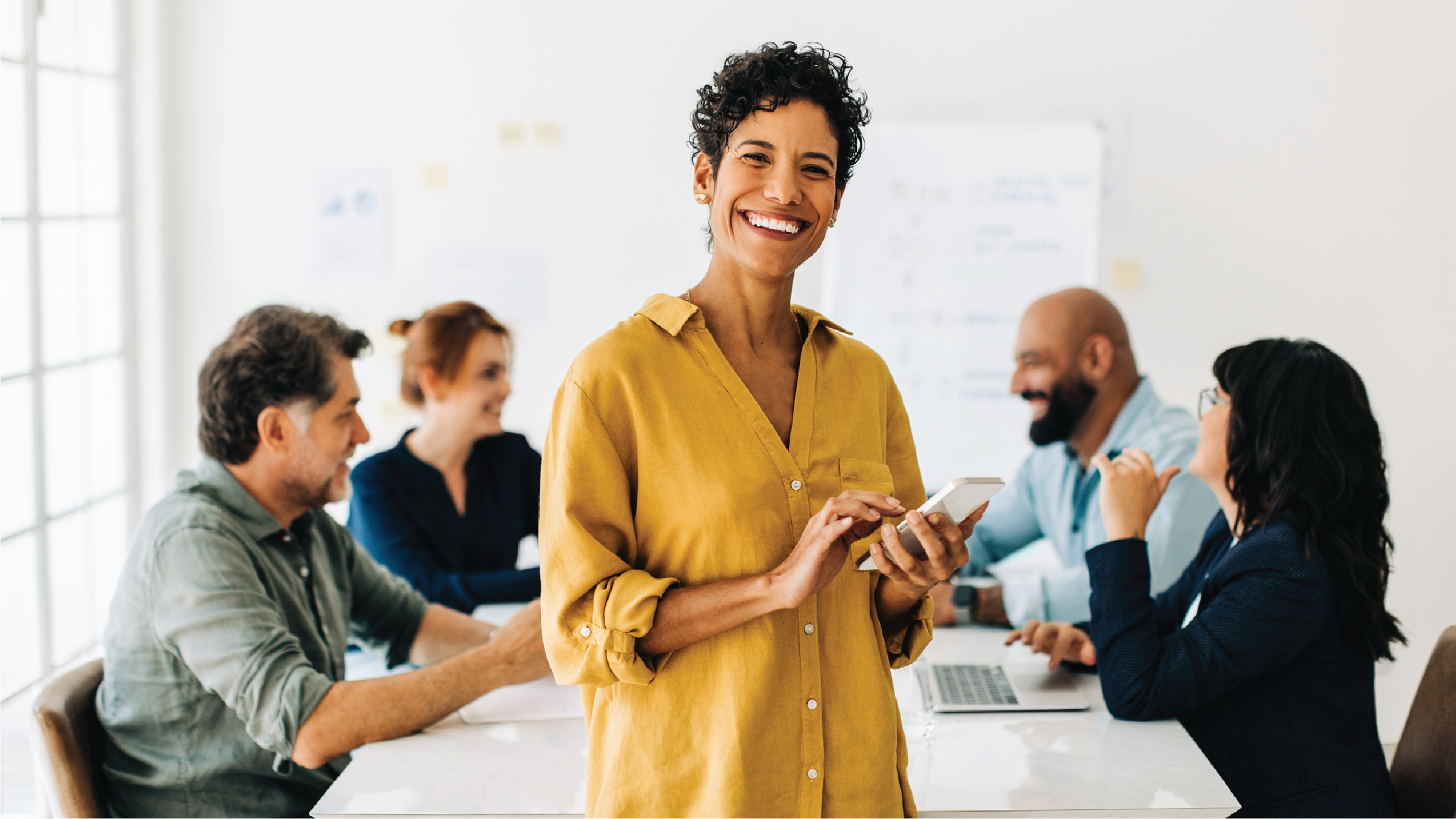 coworkers meeting and talking through presentation