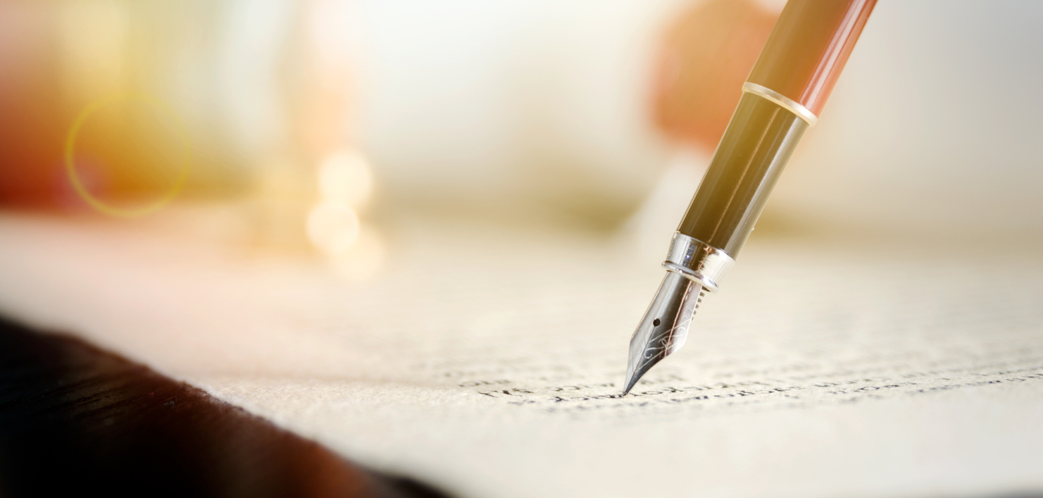 close up of pen and document