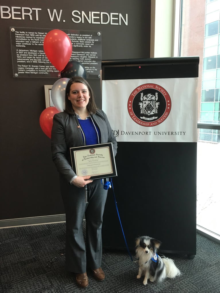 Koroleski and Mater receive a certificate from the National Society of Leadership and Success