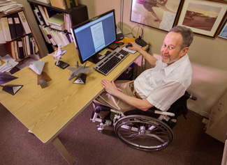 John-MacGuire-at-desk2_r.jpg