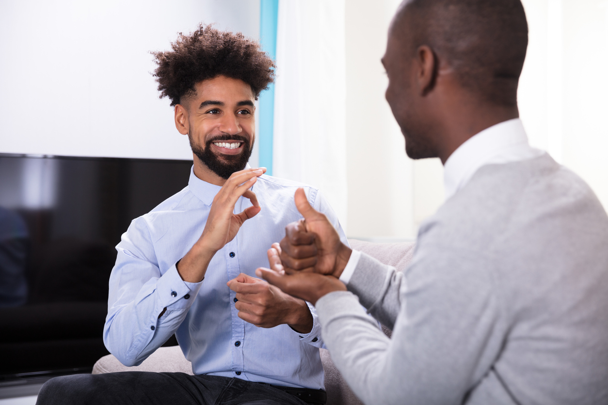 deaf worker with interpreter.jpg