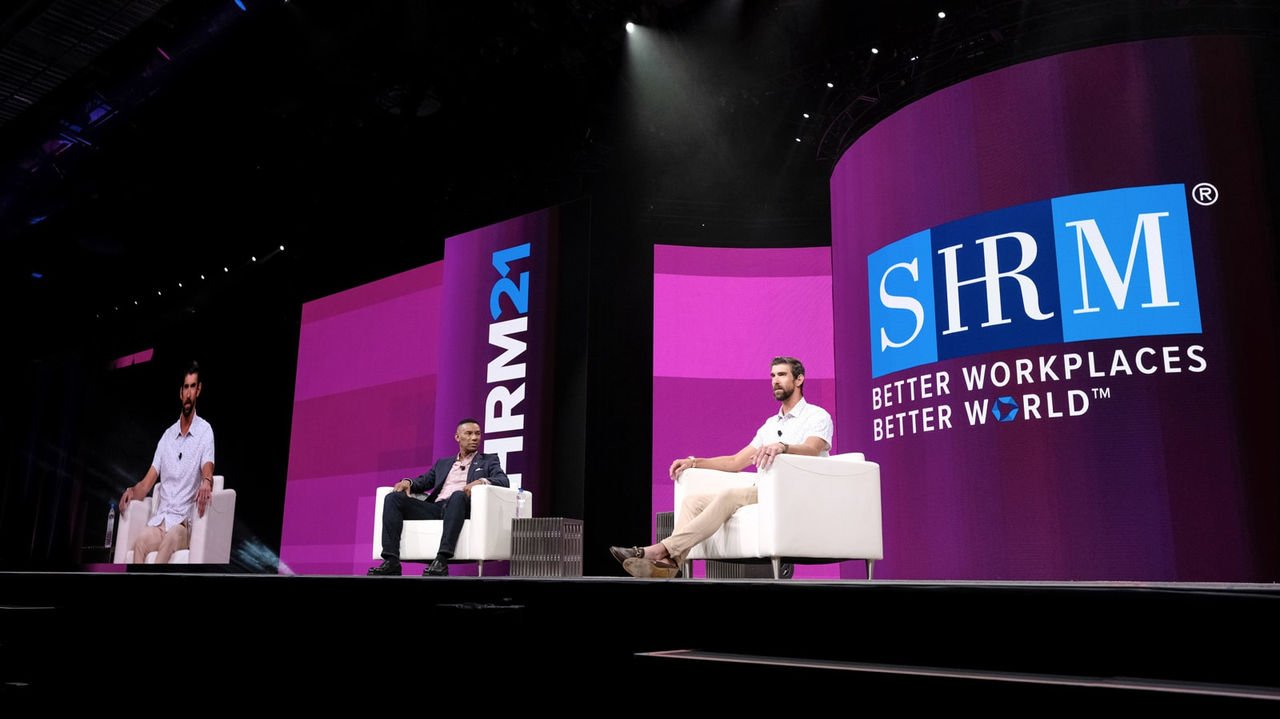 Johnny C. Taylor, Jr. and Michael Phelps on stage at SHRM Annual Conference and Expo.