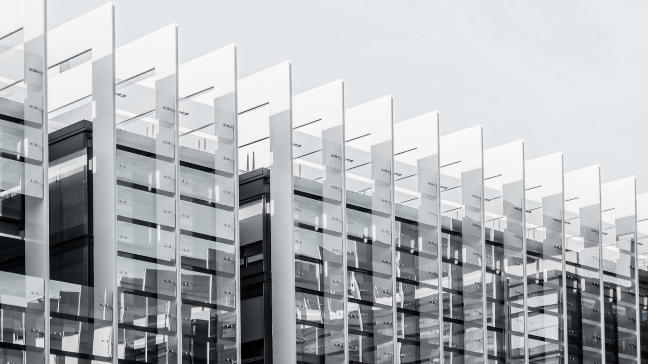 A black and white photo of an office building.