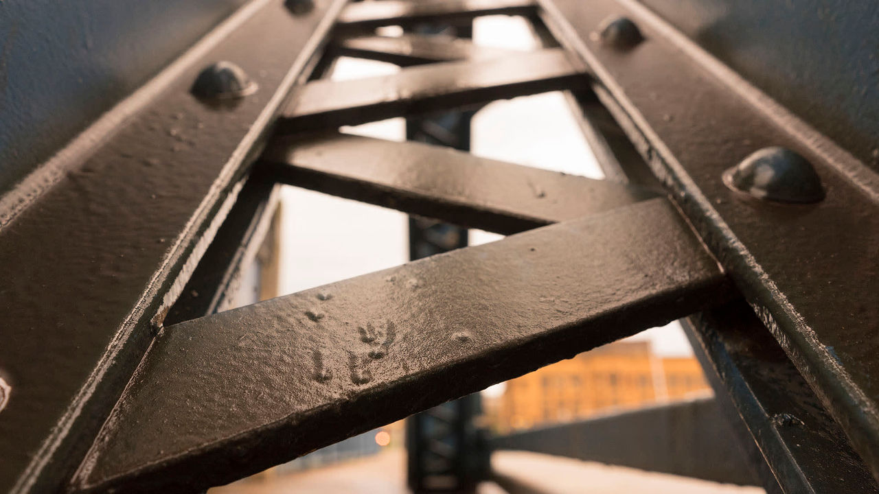 A close up view of a metal bridge.