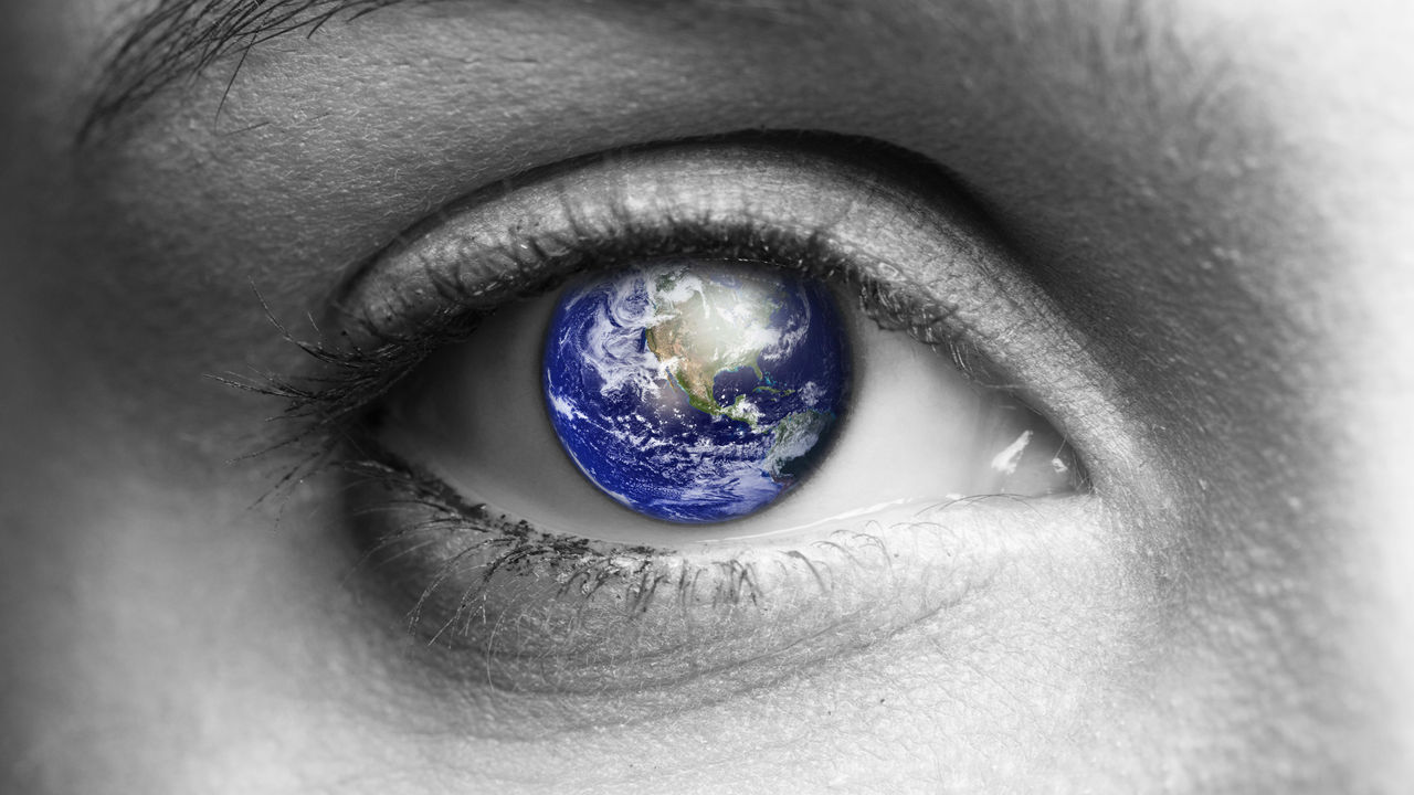 A woman's eye with the earth in it.