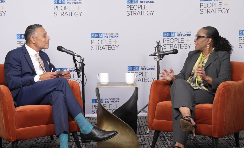 Podcast host Mo Fathelbab (seated on the left) and podcast guest Felicia Robinson (seated on the right) in conversation at the Visionaries conference.