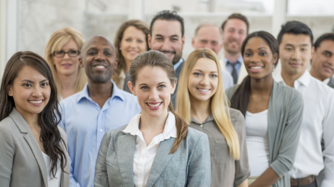 A group of business people standing together.