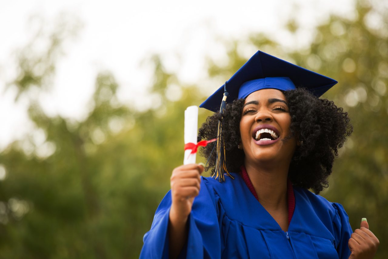 An HR student graduates with pride. 