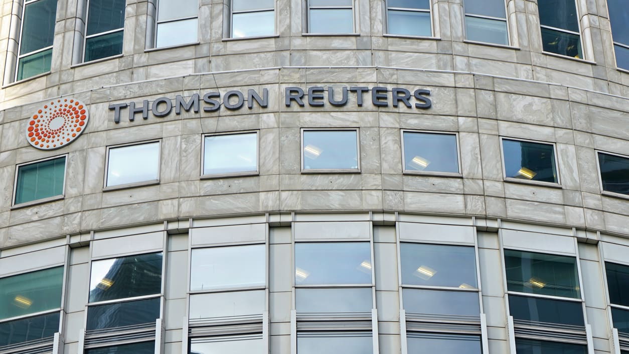 The thomson reuters building has a sign that says thomson reuters.