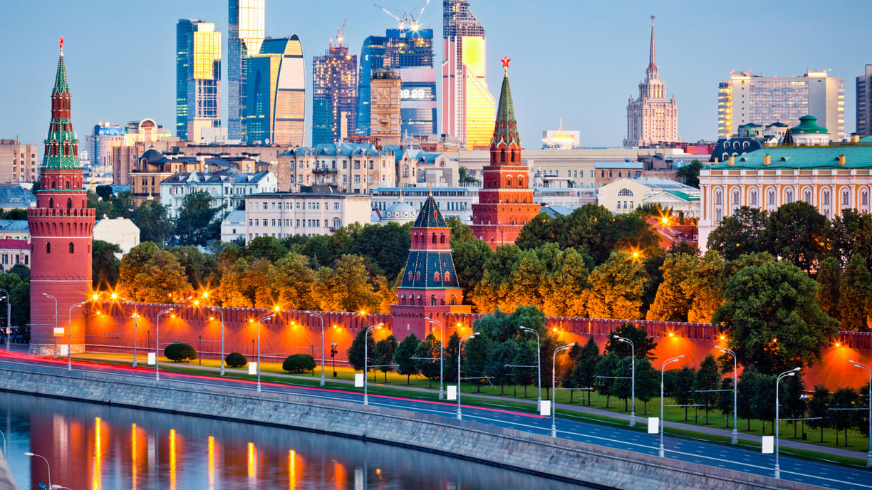 The Kremlin and Moscow skyline at dusk.