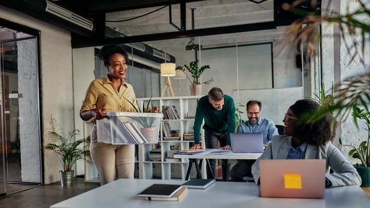 A group of people working in an office.