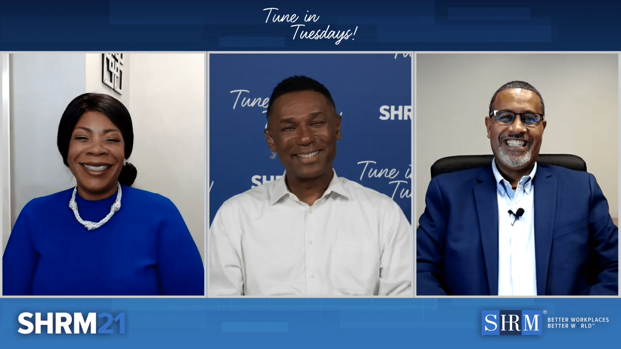 Three people are sitting on a blue background with the words shrm 4.