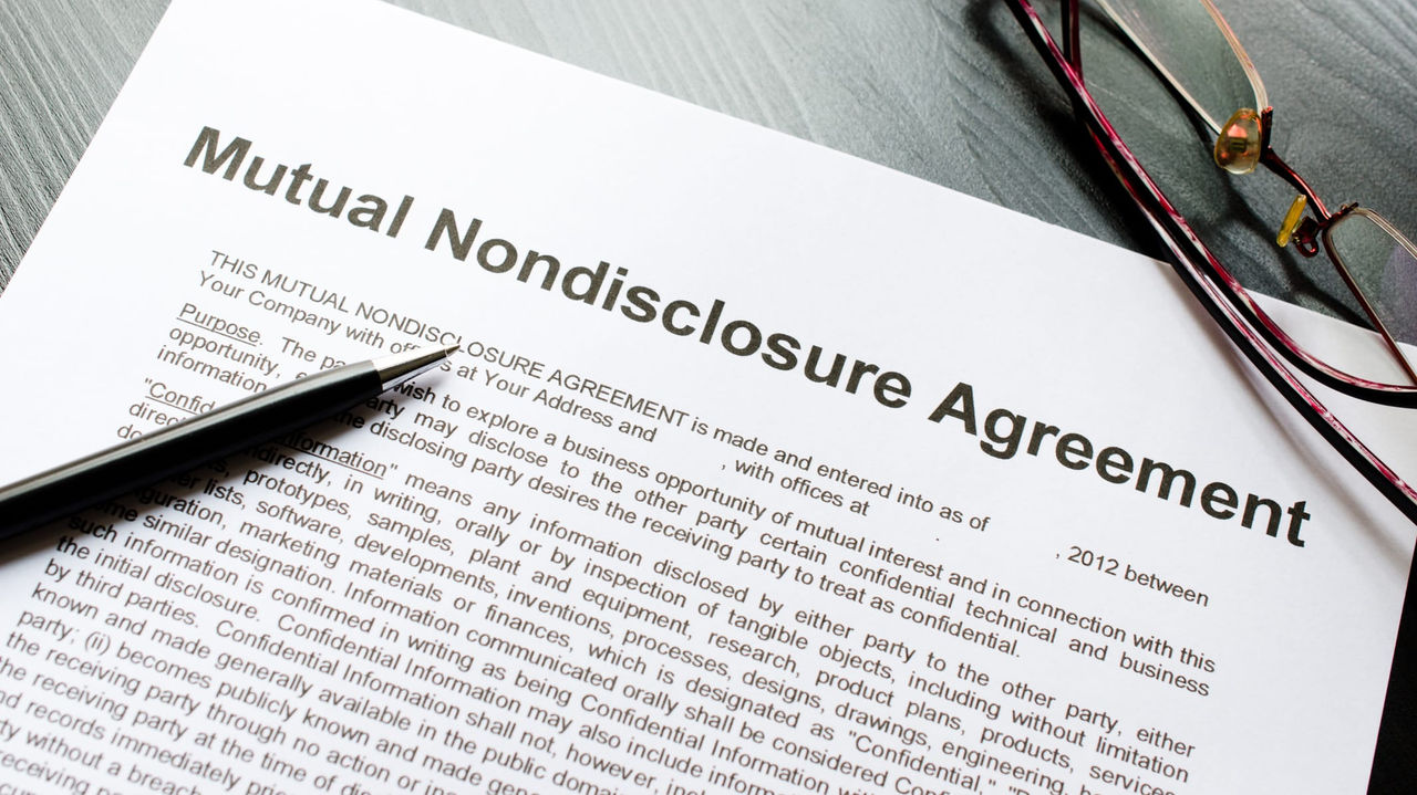 A document with the words mutual non-discharge agreement on it.