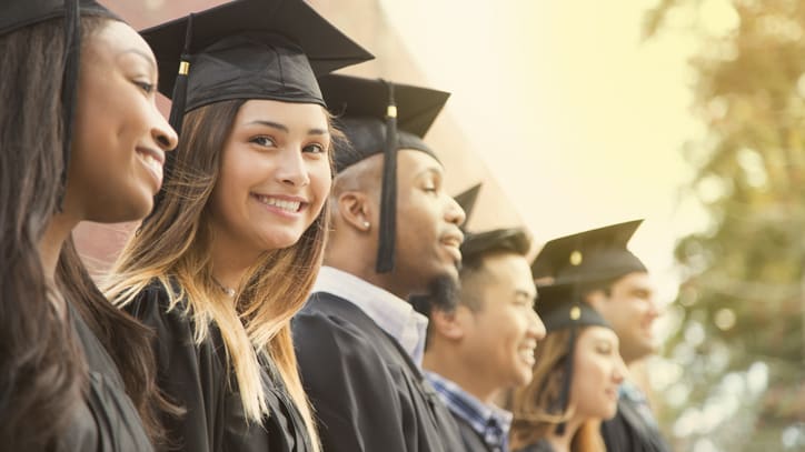 A group of graduates in graduation gowns.