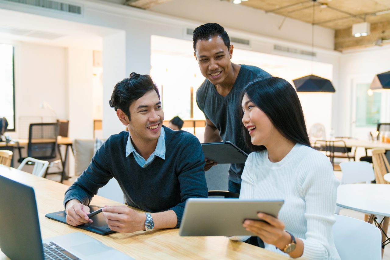 Coworkers collaborate in the workplace. 