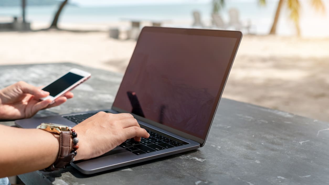 A person using a laptop.