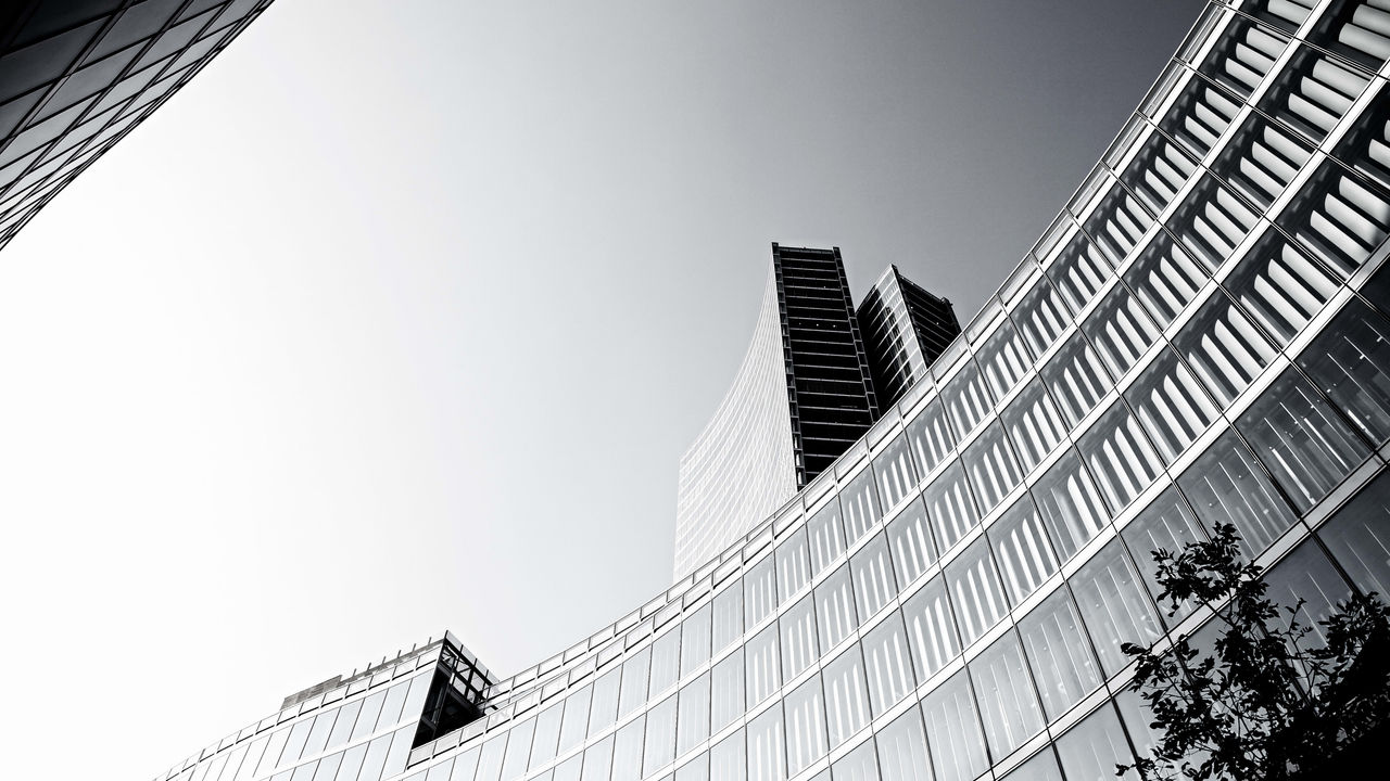A black and white photo of an office building.
