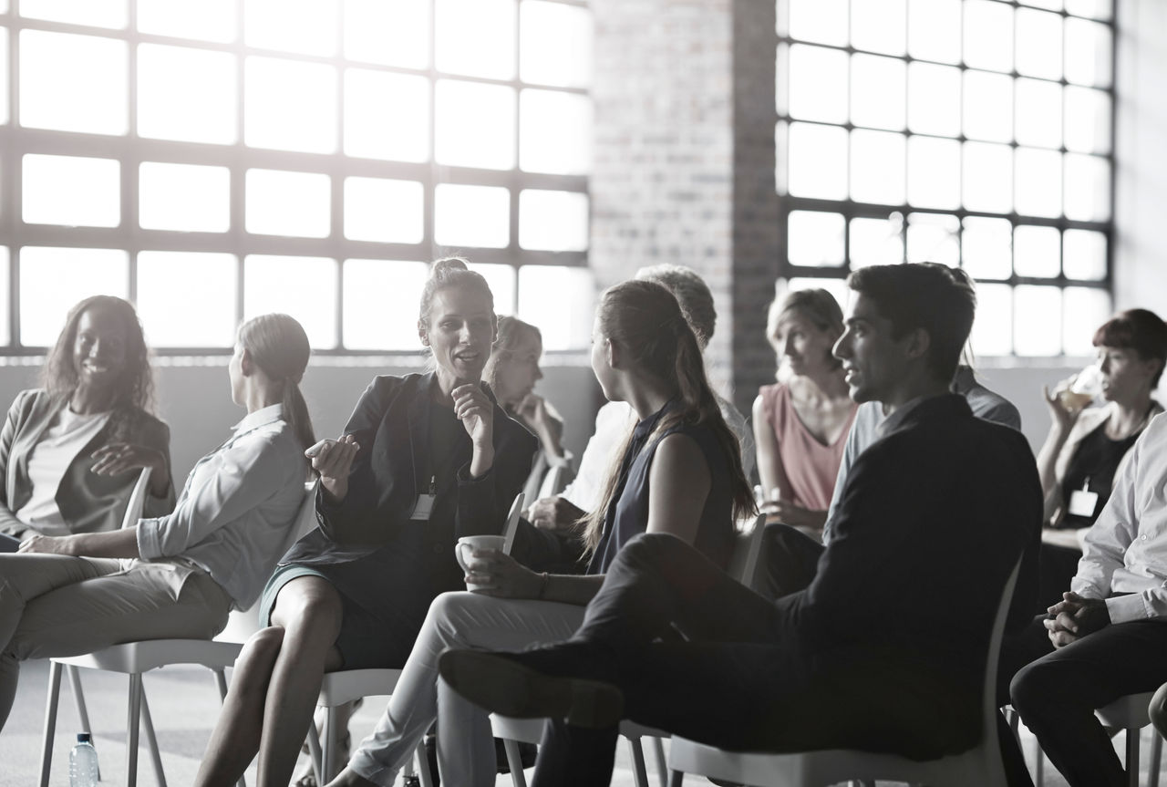 Large group of business people in conversations