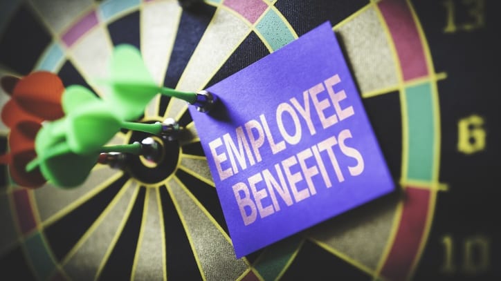 Employee benefits on a dart board.