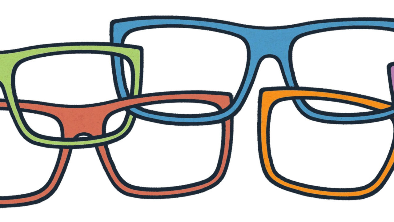 A group of colorful eyeglasses on a white background.