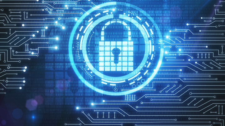 An image of a padlock on a circuit board.