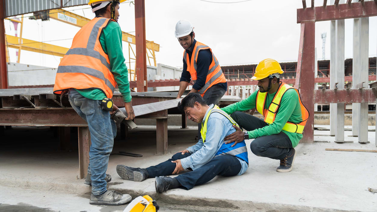 A group of construction workers on a construction site.