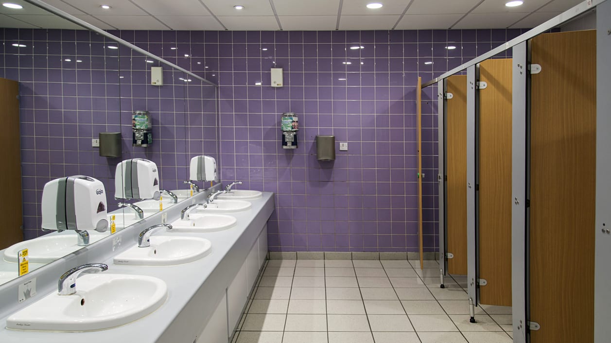 A row of sinks in a bathroom.