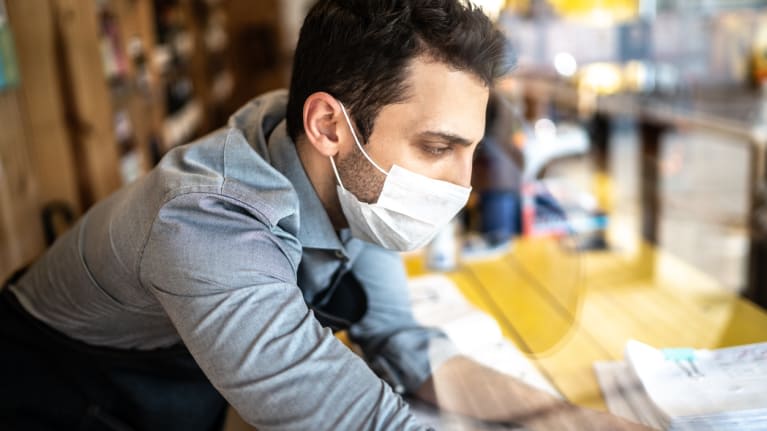 man wearing face mask at work