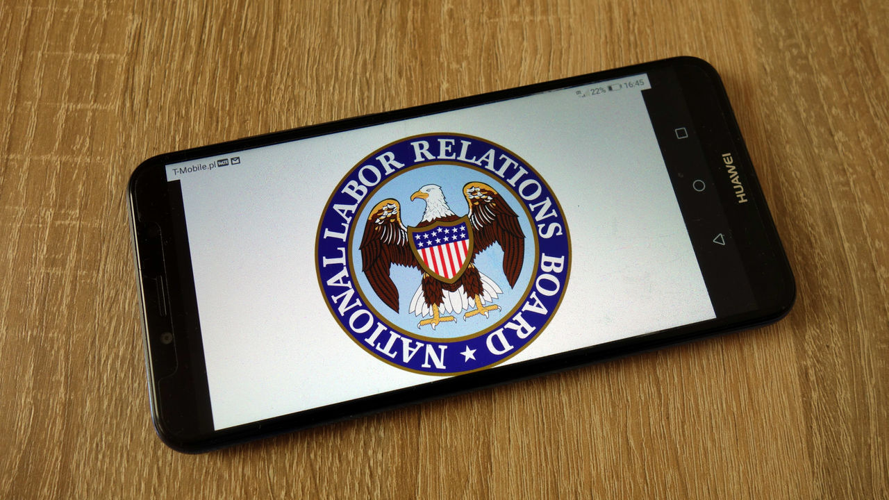 The nsa logo is displayed on a smartphone.