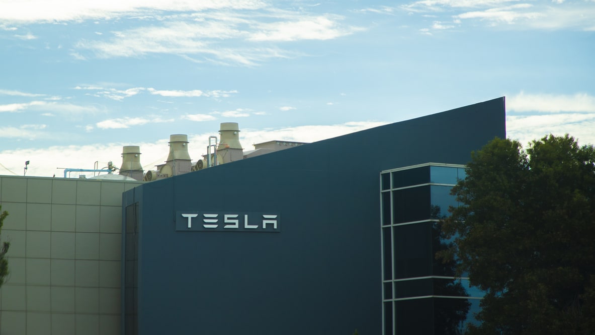 A building with a tesla logo on it.