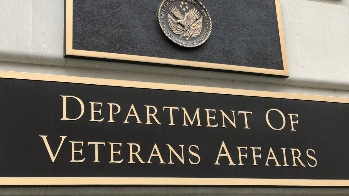 The department of veterans affairs sign is on the side of a building.