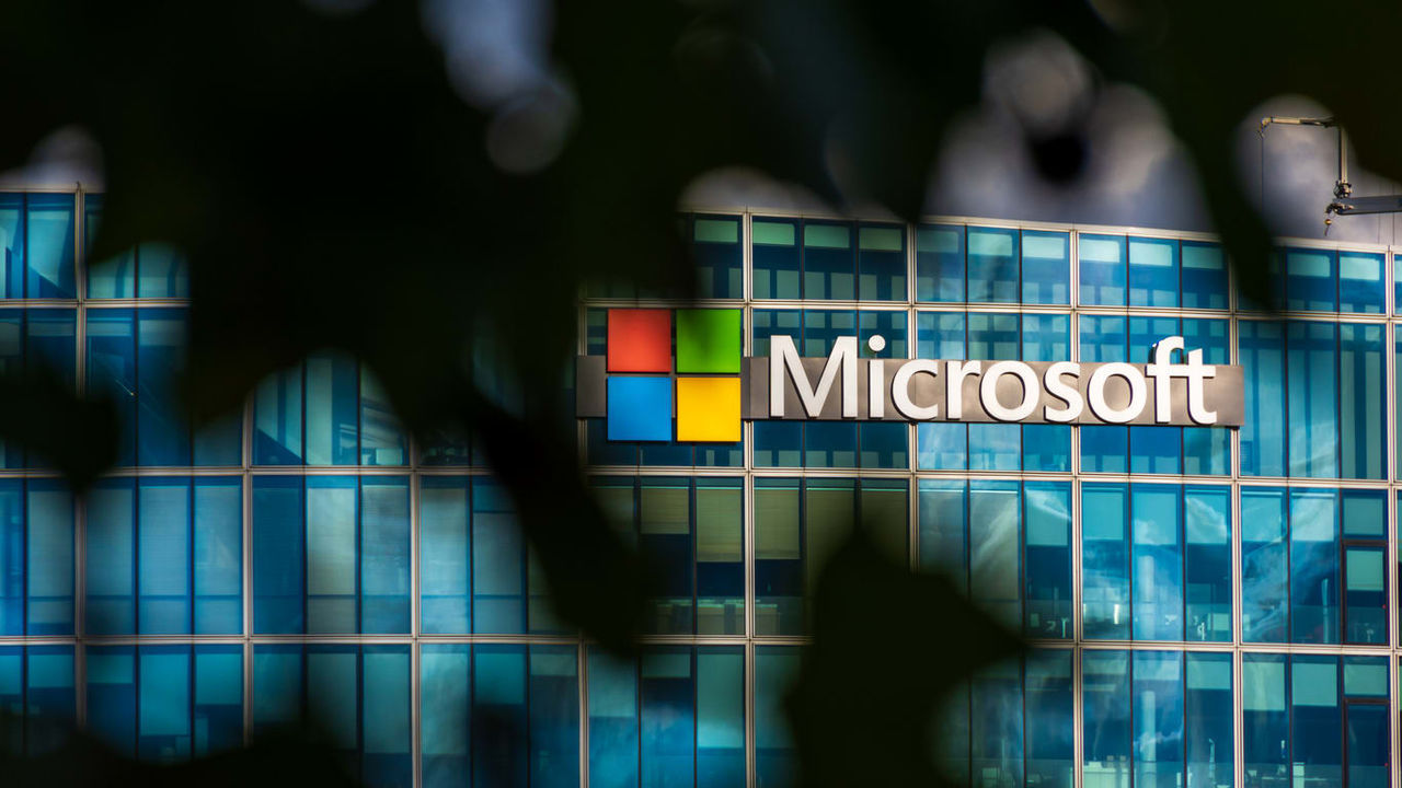 The microsoft logo is seen on a building.