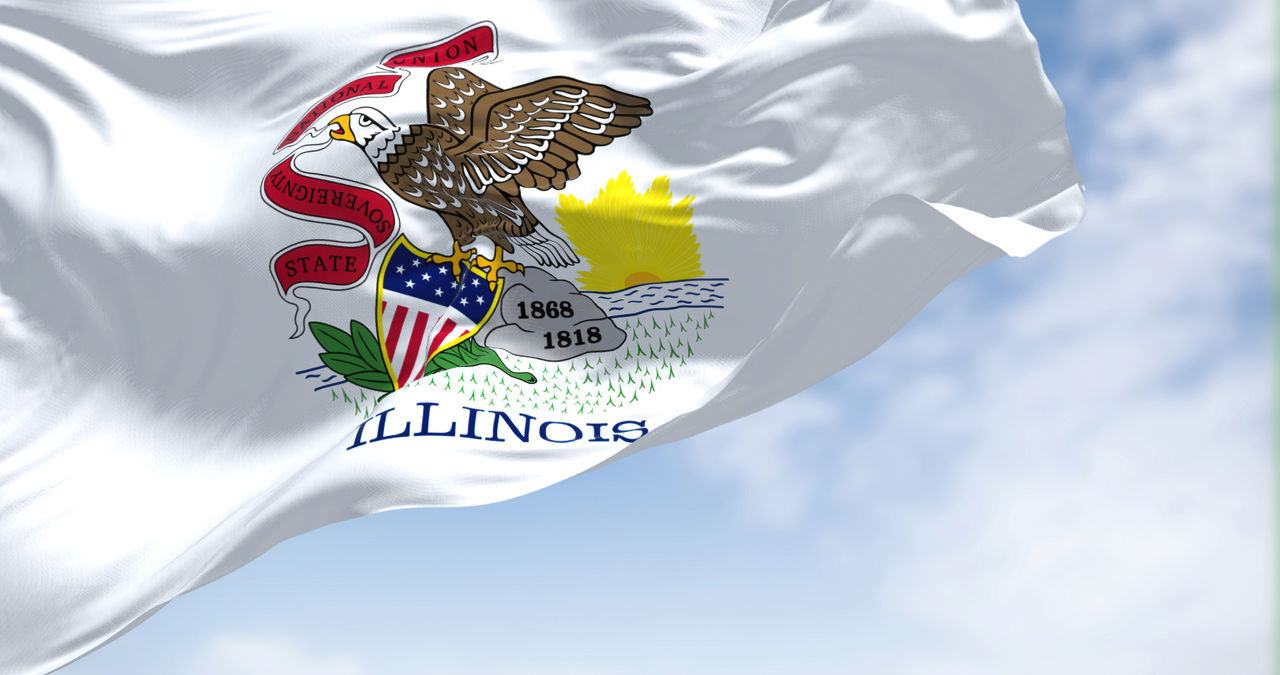 The state flag of Illinois waving in the wind. 