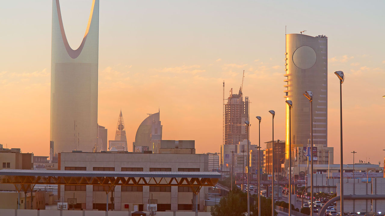 The saudi arabia skyline at sunset.