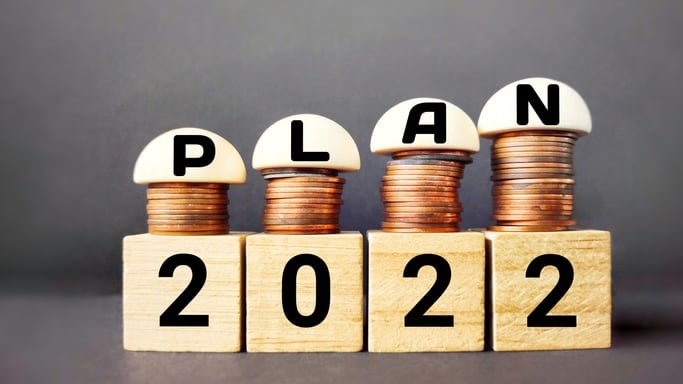 A stack of wooden blocks with the word plan 2020 stacked on top of them.