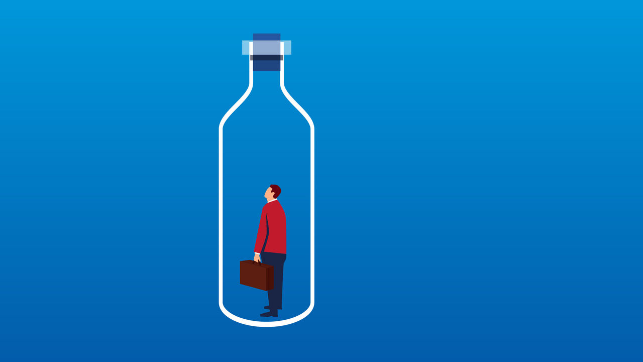 A man in a bottle with a briefcase.
