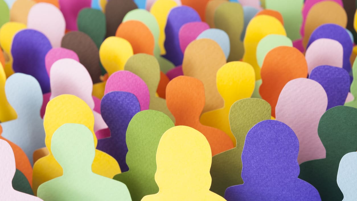A large group of colorful paper people.